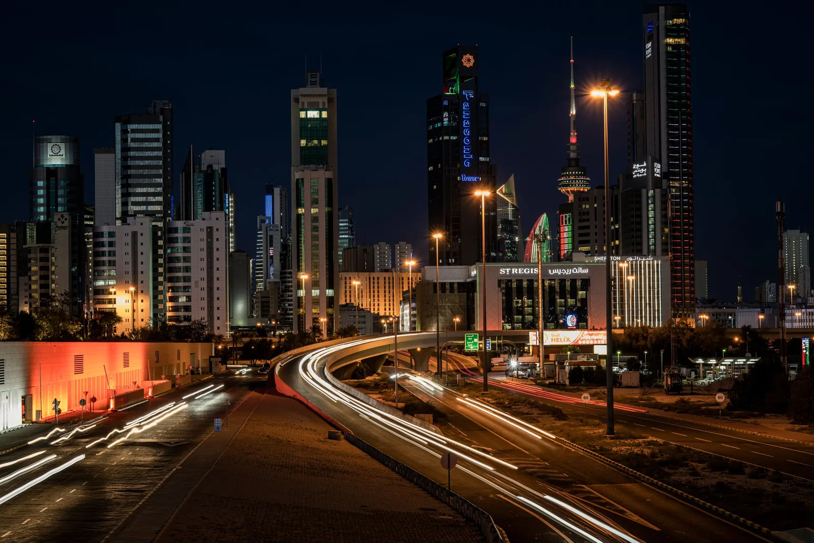 Kuwait City at night, with traffic on the roads into the centre